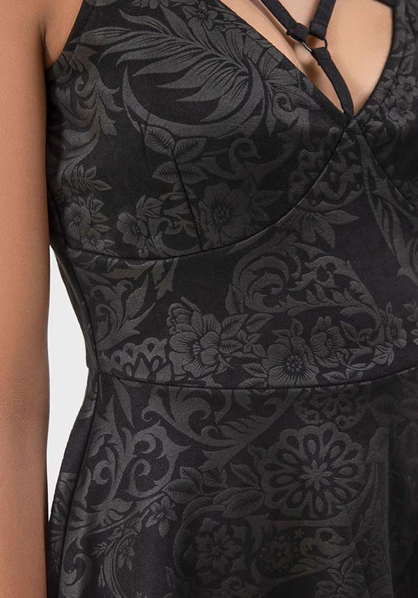 Magical Black Lily Printed Skater Style Mini Dress for Fashion Enthusiasts
