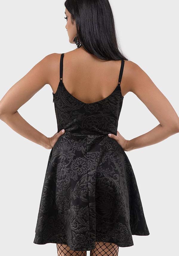 Magical Black Lily Printed Skater Style Mini Dress for Fashion Enthusiasts