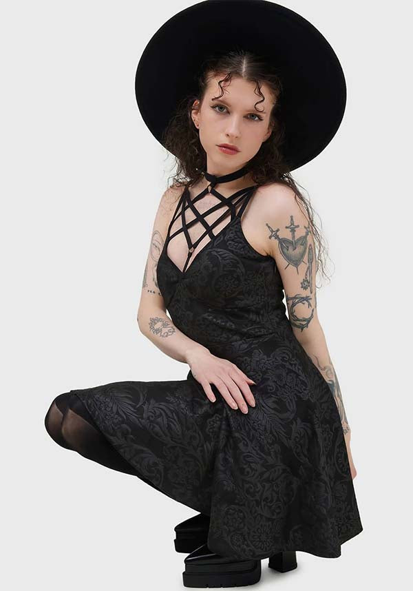 Magical Black Lily Printed Skater Style Mini Dress for Fashion Enthusiasts