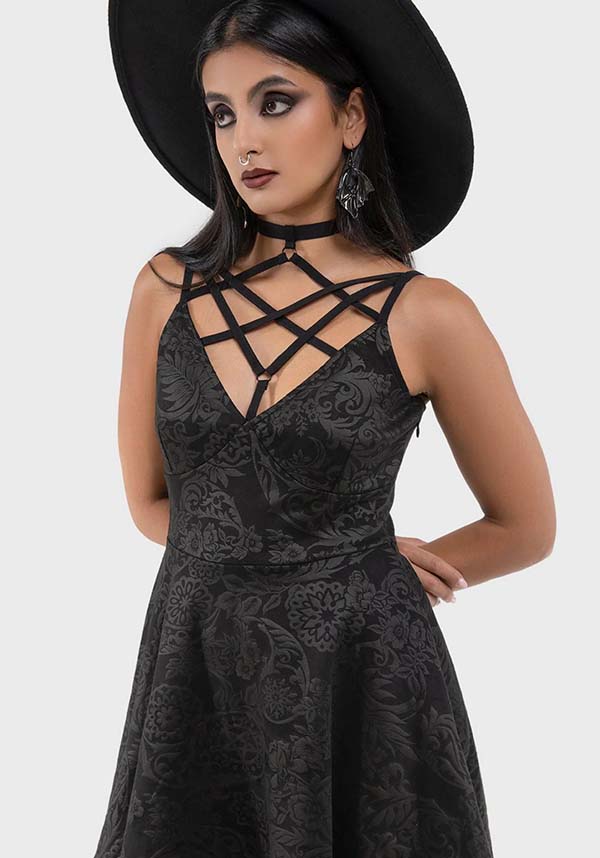Magical Black Lily Printed Skater Style Mini Dress for Fashion Enthusiasts