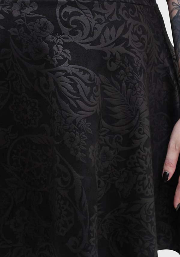 Magical Black Lily Printed Skater Style Mini Dress for Fashion Enthusiasts