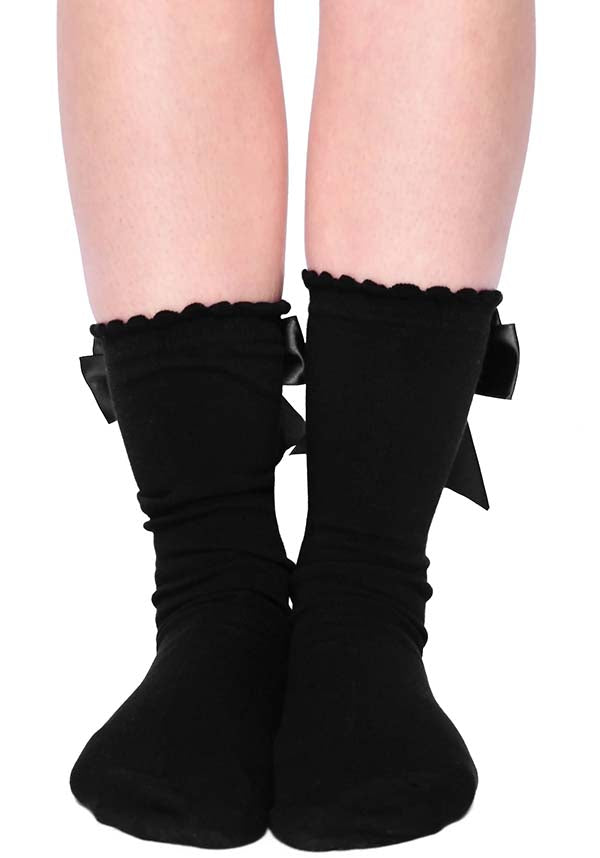 Adorable Black Crew Socks with a Black Ribbon Bow Decoration