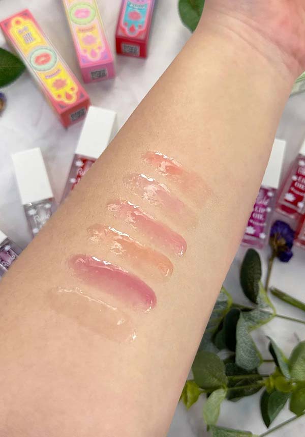 Rude Cosmetics Chillaxin’ Cherry Flavored Lip Oil for a Moisturizing Lip Massage
